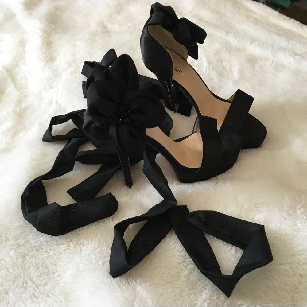 Brand new, never been worn, black high heels